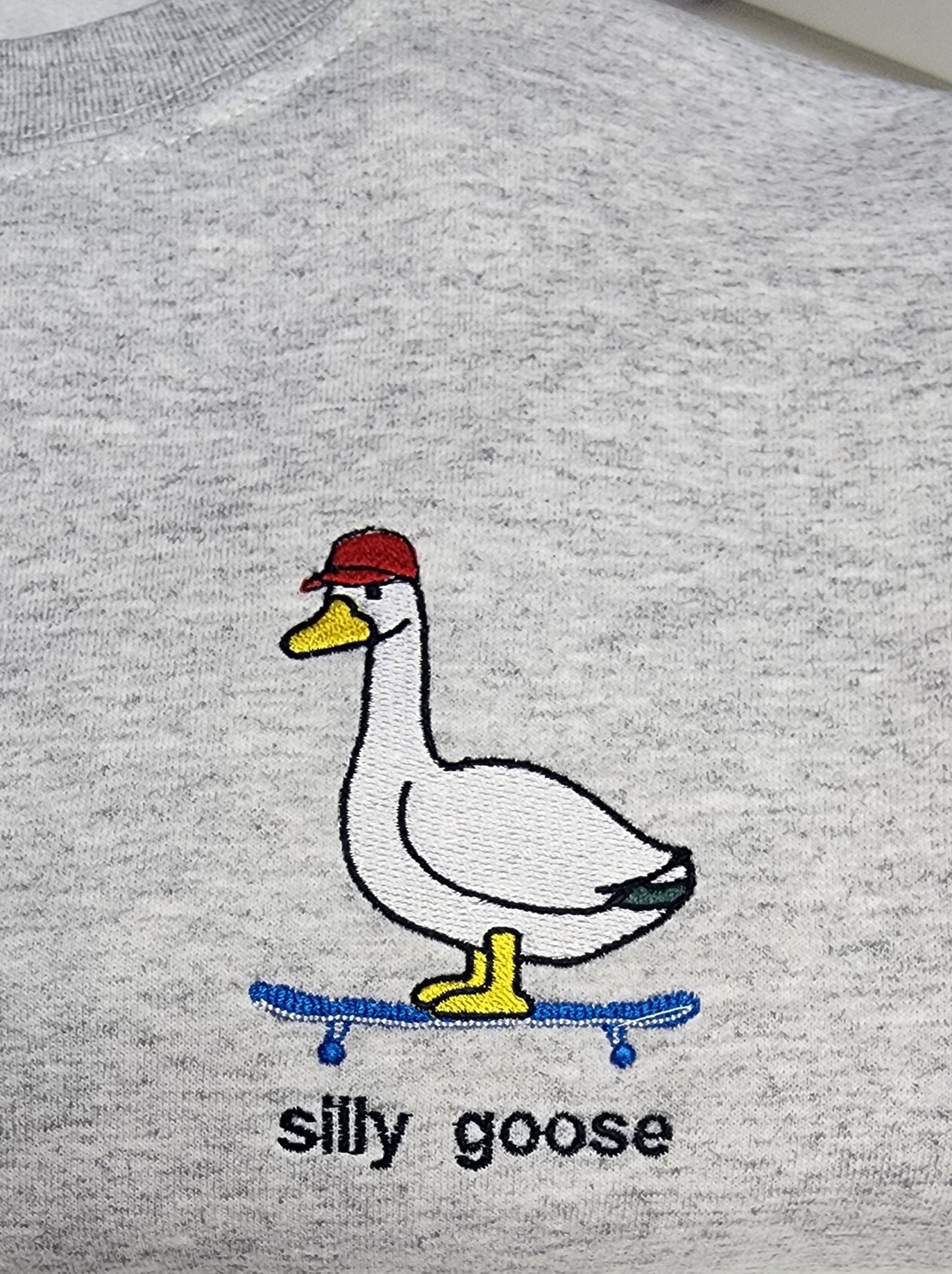 Silly Goose Skate Board Embroidered Sweatshirt - Funny Silly Goose Embroidered Sweatshirt - Embroidered Pocket Design